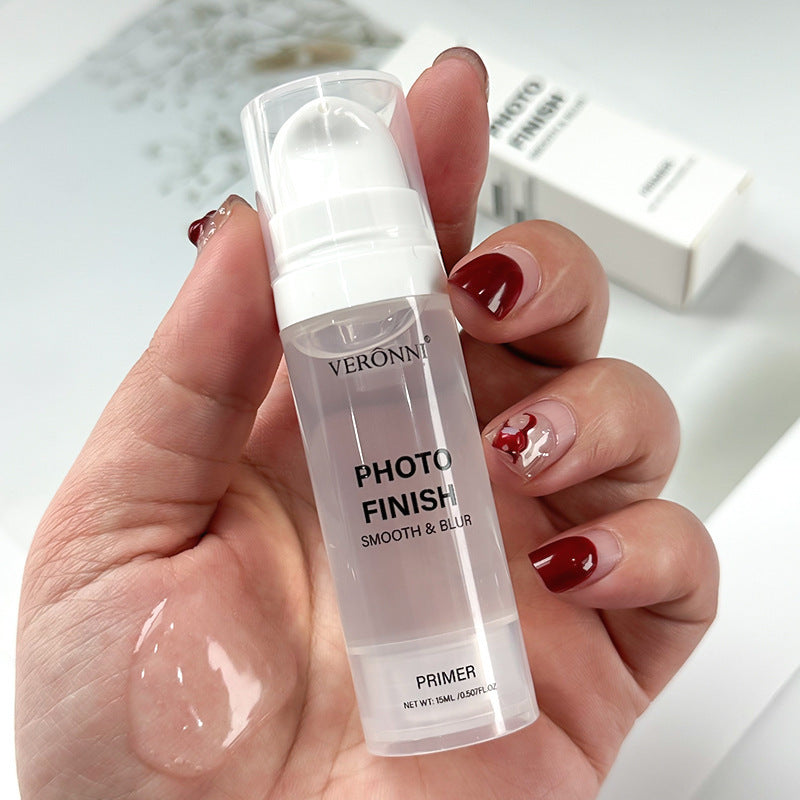 VERONNI Photo Finish Smooth & Blur Primer in hand, showcasing oil control makeup primer for flawless skin.