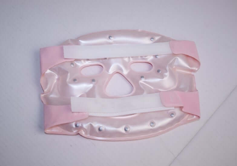 Beauty moisturizing whitening face mask with pink straps, designed for deep skin penetration and rejuvenation.