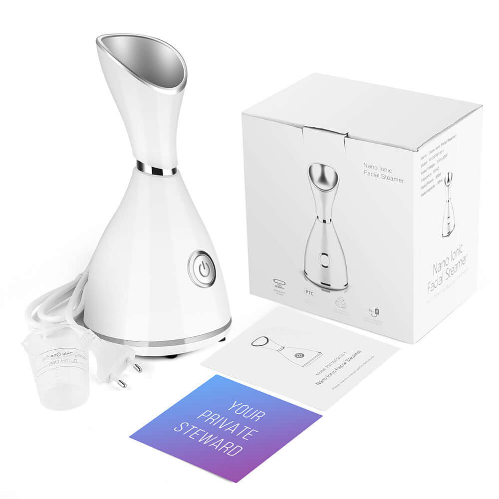 White beauty steamer facial moisturizer with box, cup, and instructions for at-home skin care.