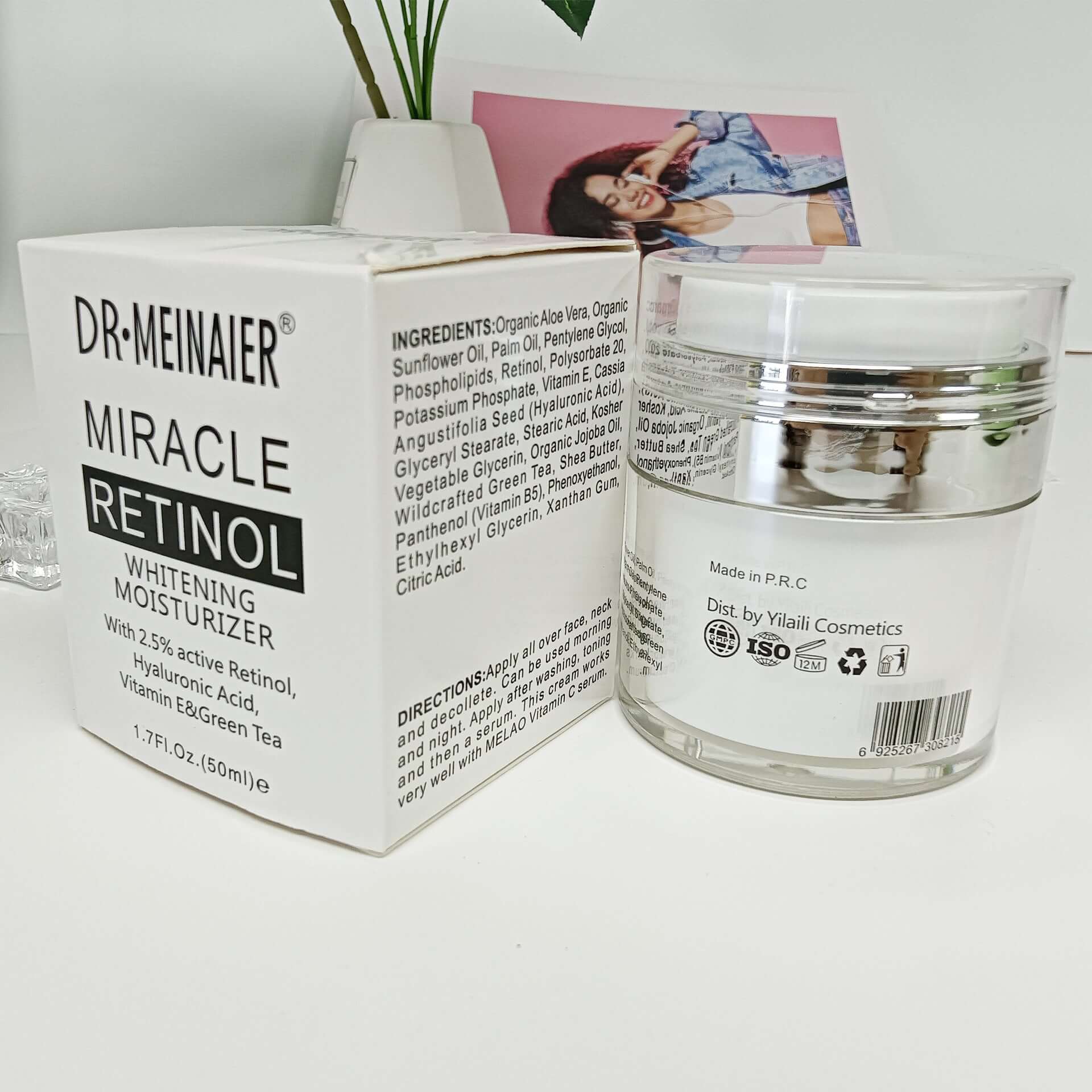 Retinol moisturizing cream in a glass jar with packaging, moisturizing and brightening skin, shrinks pores.