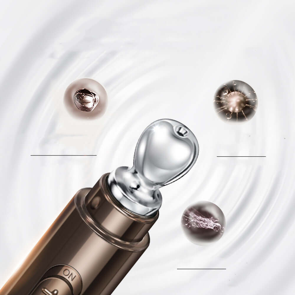 Close-up of a golden caviar eye cream applicator with active ingredients for firming eye skin care.