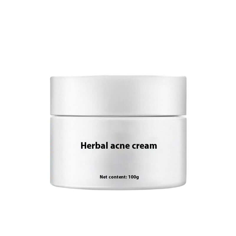 Herbal acne cream in a sleek white jar, 100g, designed to reduce acne with effective ingredients.