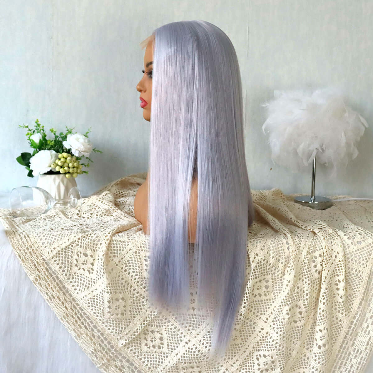 Purple straight chemical fiber wig displayed on a mannequin, showcasing its natural look and long length.