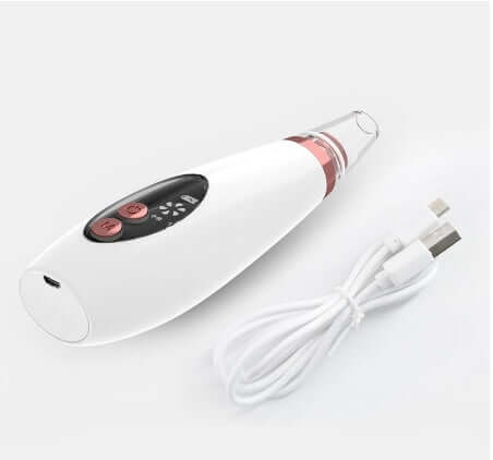 Microcrystalline blackhead remover device with USB charging cable, designed for effective pore cleansing at home.