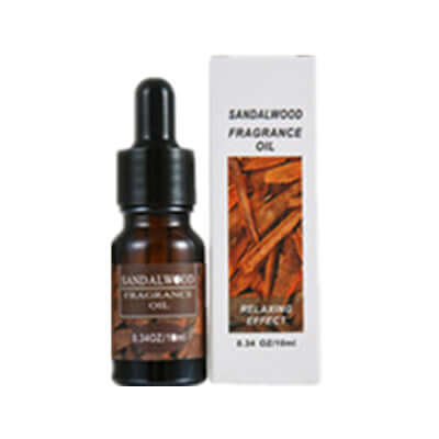 Sandalwood fragrance oil bottle with relaxing effects in packaging for aromatherapy.