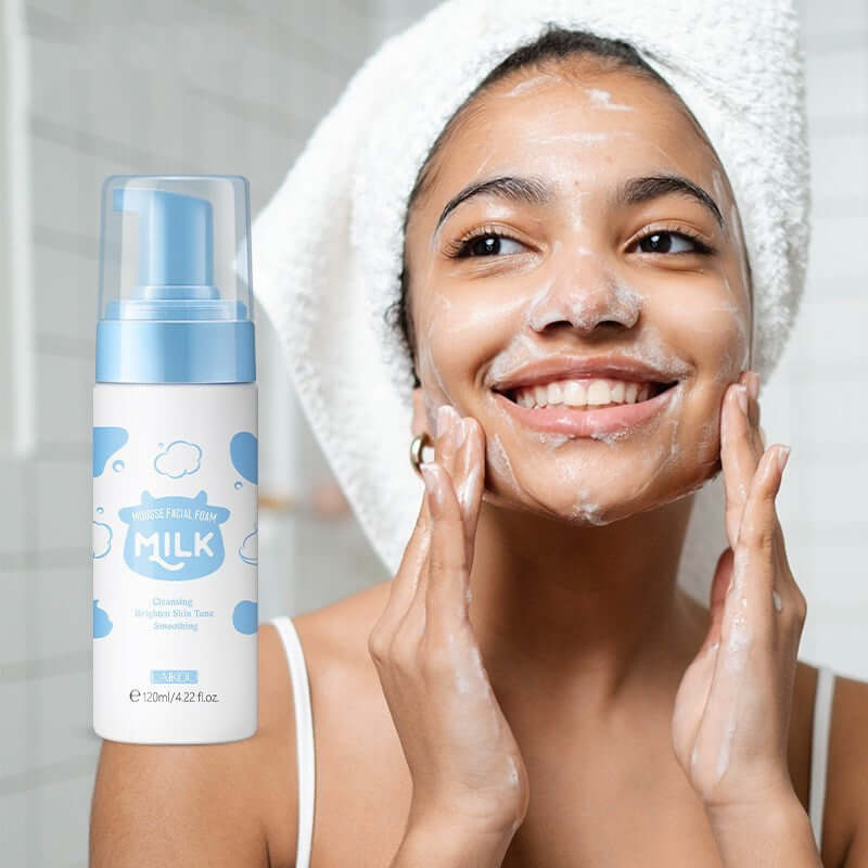 Smiling woman cleansing her face with a 120ml milk cleanser, showcasing deep cleaning skin care effectiveness.