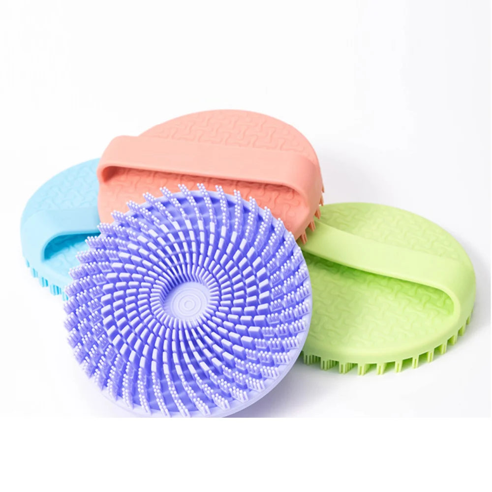 Silicone body cleansing brush for effective shower exfoliation and gentle massage in pastel colors.