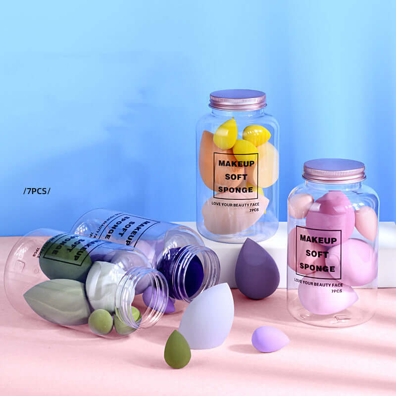 Drift Bottle Boxed Beauty Egg with 7 Powder Free Makeup Sponge Puffs in various colors and jars.
