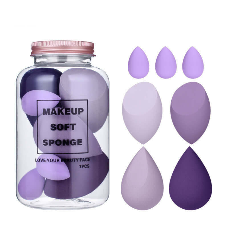 Drift Bottle Boxed Beauty Egg 7 soft makeup sponges in shades of purple, packed for easy makeup application.