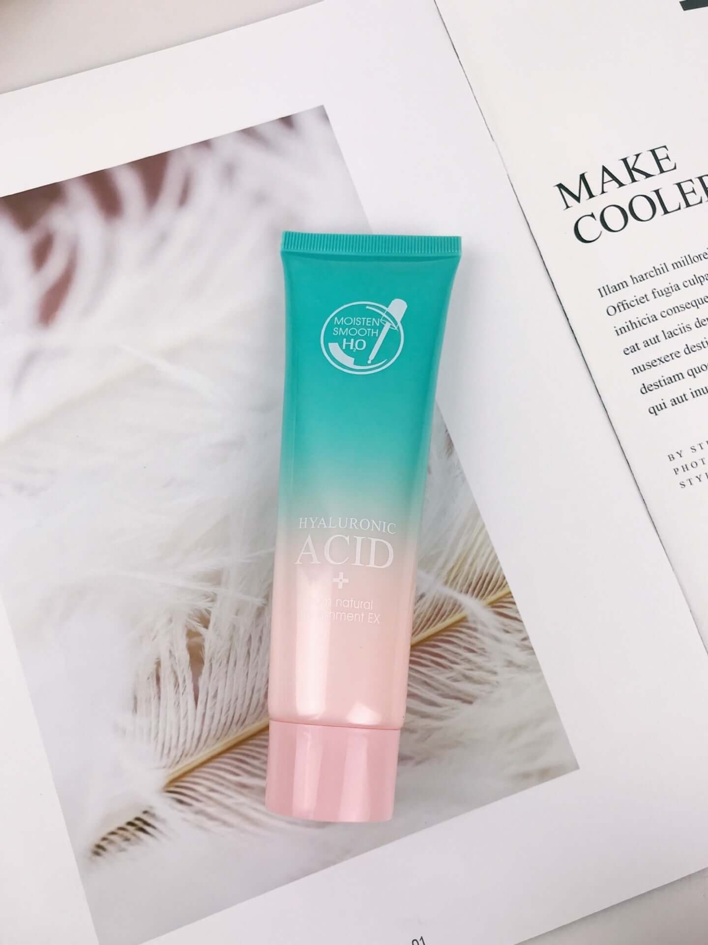 Hyaluronic Acid moisturizing facial care product tube on a magazine background, ideal for all skin types.