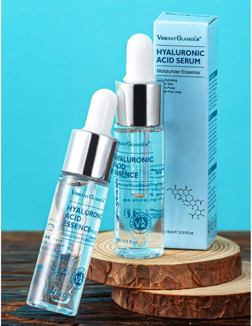 Vibrant Glamour Hyaluronic Acid Serum moisturizer essence for hydrating and revitalizing skin, 15ml packaging displayed.