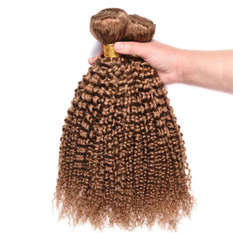 Medium length kinky curly wave human hair bundles in a hand, suitable for any skin tone and face shape.