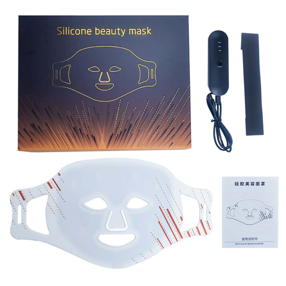 Silicone beauty mask for skin rejuvenation and wrinkle removal, including remote control and user manual.